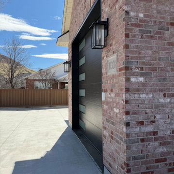 Utley Project: Black Glass Garage Doors and Modern Lanterns