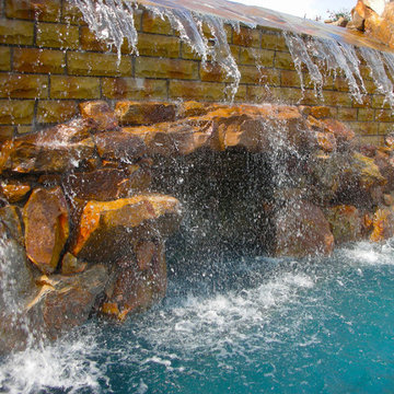 Grotto under Roaring Waterfall