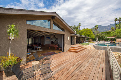 Example of a 1950s backyard deck design in Santa Barbara
