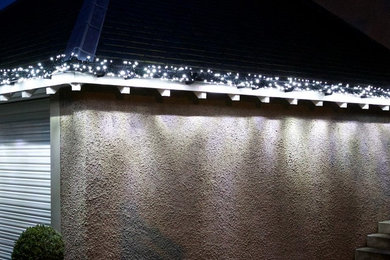 Ice White Cluster Lights on Garage Guttering