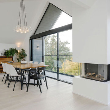 Feature full height gable glazing at 1960s bungalow conversion