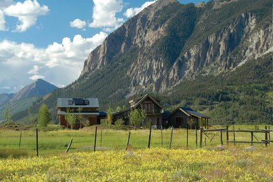 Example of an arts and crafts exterior home design in Denver
