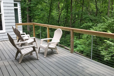 Mid-sized minimalist backyard deck photo in Philadelphia with no cover