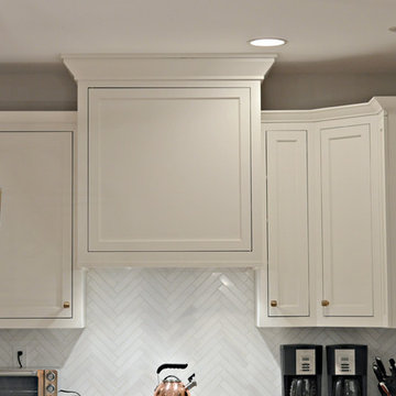 Chappaqua NY - Custom White & Navy Cabinets w/ Honey Bronze