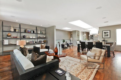 Living room - large contemporary formal and open concept dark wood floor living room idea in San Francisco with gray walls