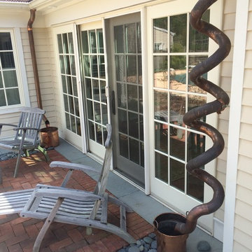 The Roofer's copper Downspouts