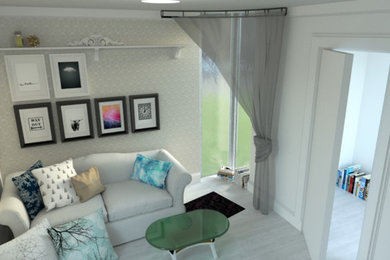 Inspiration for a mid-sized contemporary enclosed light wood floor family room library remodel in Hampshire with white walls, no fireplace and no tv