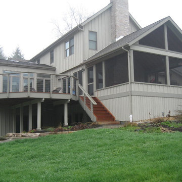 Exterior view of screen porch and new deck.