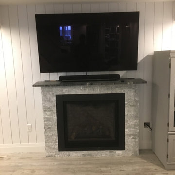 Basement Renovation with Entertainment and Exercise Space