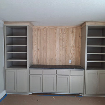 Greige Custom Built-In Wall Unit with Vertical Wood Plank Backing & Dark Counter