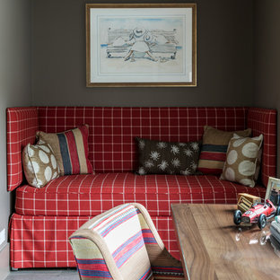 Design ideas for a beach style home office and library in Sussex.