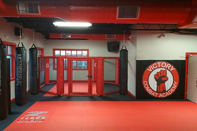 Example of an urban home gym design in Other