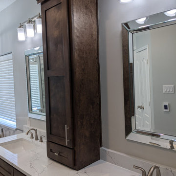Marble and espresso bathroom
