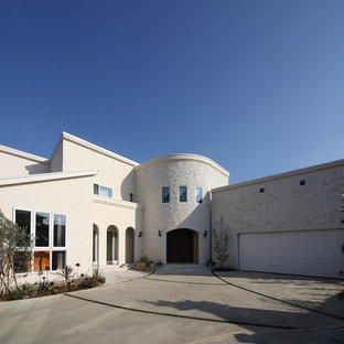 東京都下の地中海スタイルのおしゃれな家の外観 (片流れ屋根、戸建) の写真