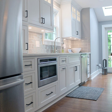 White Painted Kitchen with Gray Island