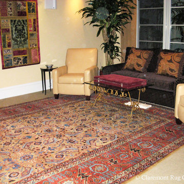A Prized 19th Century Bakshaish Camelhair Rug In A Comfortable Media Room