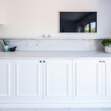 White Kitchen with Shaker Cabinets and Marble Benchtops