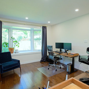 Shared Home Office with Large Window and Reading Nook | Etobicoke