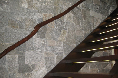 Staircase - mid-sized craftsman wooden straight open staircase idea in Orange County