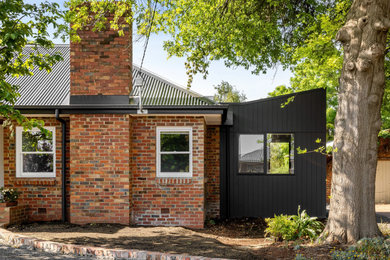 This is an example of a contemporary exterior in Melbourne.