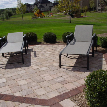 Formal paver patio gardens