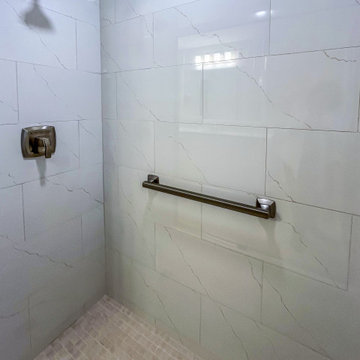 Timeless White Vanity Paired with Luxury Tiled Shower