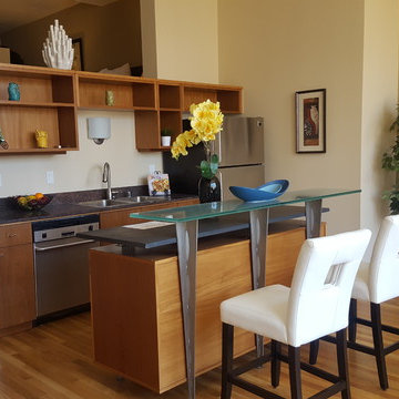 Loft Kitchenette with Glass Breakfast Bar and Open Shelving
