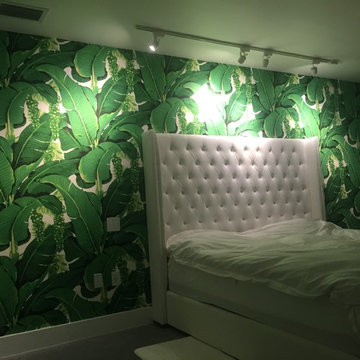 vintage wall-covering installation and flamingo wallpaper