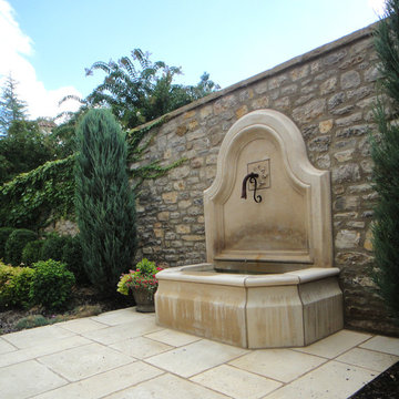 Cast stone courtyard fountain with basin
