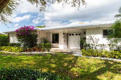 Example of a trendy exterior home design in Miami