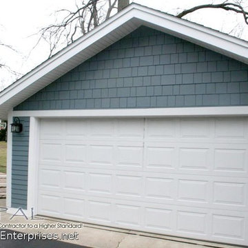 Shingle & Plank Boothbay Blue Hardie Siding, White Trim & Gutters in Wheaton