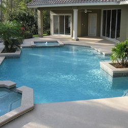 Freeform Geometric Pool with Spas and Greenery - Products