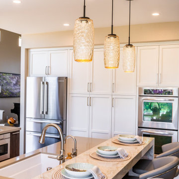 Textured Glass Pendants Over Marble Island