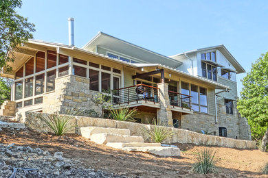 Home design - large contemporary home design idea in Austin