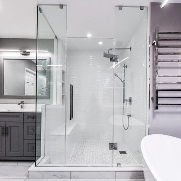Striking Master Ensuite Featuring a Built-In Electric Fireplace