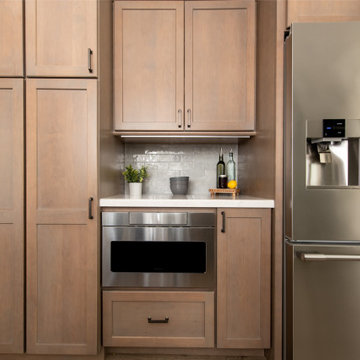 Ample Storage Space in Kitchen Remodel with Easy Access Microwave Drawer