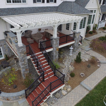 Zuri Deck with Cedar Pergola and Stone Fireplace with Grill