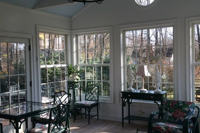 Sunroom - large traditional light wood floor sunroom idea in New York with a standard ceiling