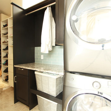 Compact Upstairs Laundry Room with Dark Stained Cabinets