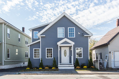 Example of a transitional exterior home design in Boston