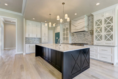 Transitional kitchen photo in Oklahoma City with shaker cabinets