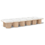 Meridian Furniture - Pavilion Black Boucle Fabric Bench, Cream, Natural Finish, 108" W X 31" D X 17.5" H - Bring valuable seating and remarkable style to your space with this cream Pavilion boucle fabric bench, an exquisite balance of style and usability for the entryway, bedroom, and beyond. Crafted from oak veneer with a natural finish, this bench has a 4-inch-thick seat cushion that's channel-tufted for a touch of luxury. The bench's columnar bases add a dash of art deco design, making it a captivating focal point in any room.