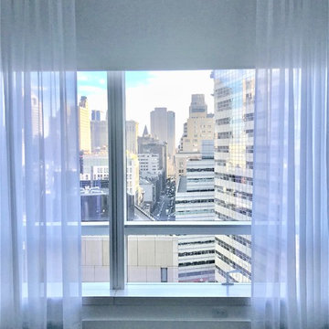 111 Murray St- Battery Operated Shades and Curved Drapery