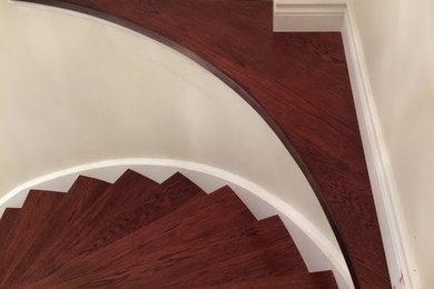 Curve staircase from carpet to hardwood cherry stain in Mississauga Oakville sho