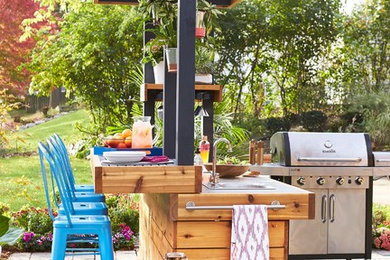 Example of a trendy backyard patio design in Other