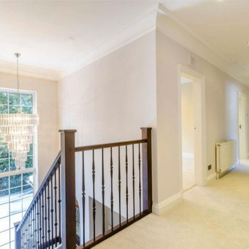 Staircase Renovation | Forged Steel & Stained Oak | Knutsford