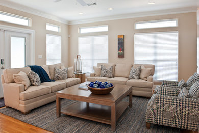 Living room - large traditional open concept medium tone wood floor and brown floor living room idea in Other with beige walls, a standard fireplace, a stone fireplace and a wall-mounted tv