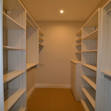 Large walk-in master bedroom closet.
