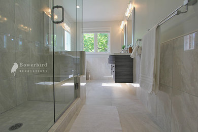 Large minimalist master gray tile bathroom photo in Toronto with gray cabinets