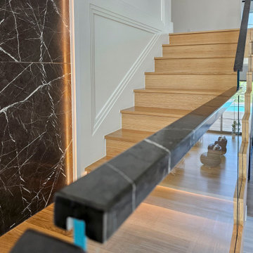 Project #107 | Freestanding Staircase with Marble Backdrop